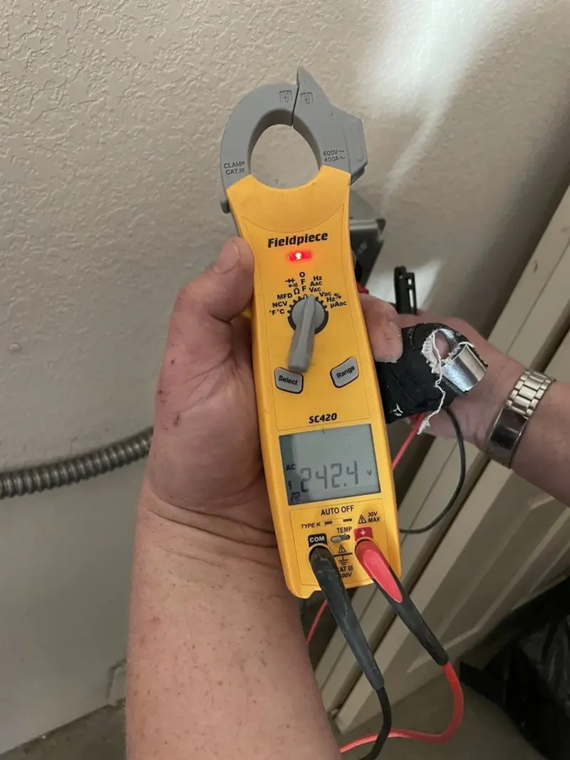 Voltage testing with clamp meter during Aluminum Wiring Replacement in Natchitoches